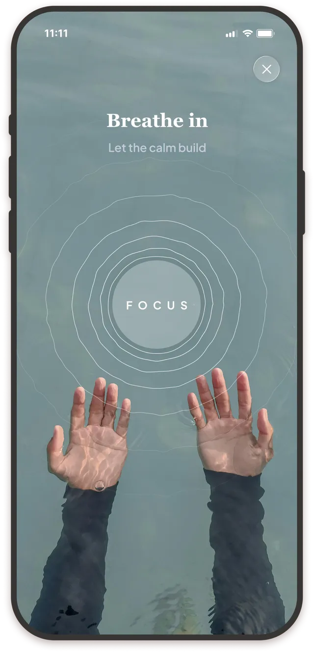 Gentle guided breathing session screen with the prompt Breathe in, let the calm build
