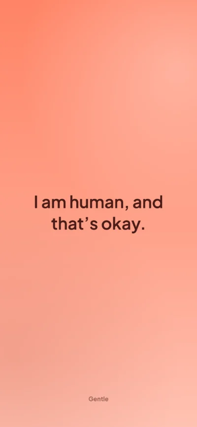Affirmation wallpaper for iPhone: “I am human, and that's okay.” on a coral background